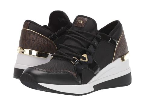 michael michael kors liv logo mixed media trainer|Michael Kors Women's Liv Trainer Signature Logo Sneakers.